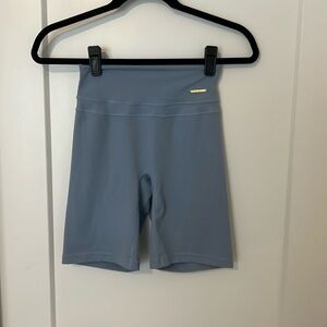 Light blue gym shark x Whitney Simmons high waisted biker shorts